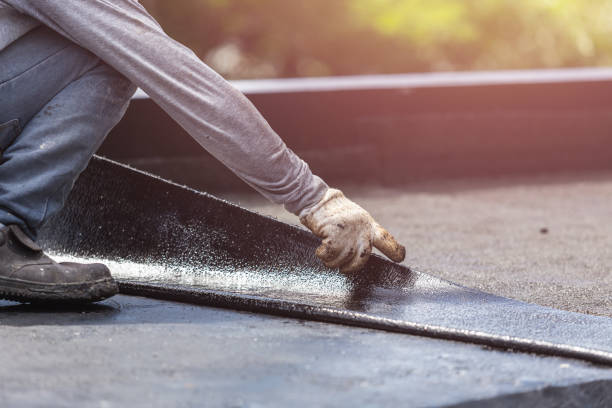 Professional Basement Waterproofing technician working in Jasper, TN